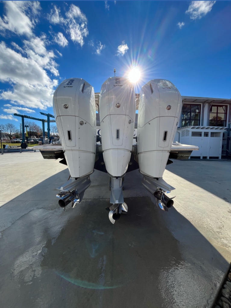 Triple outboard motor maintenance and service