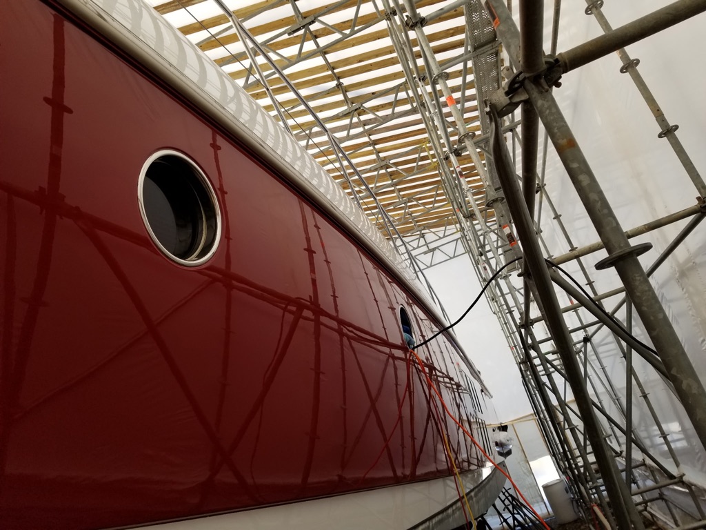 Red boat hull paint restoration