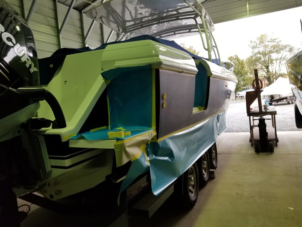 Boat with green accent paint work
