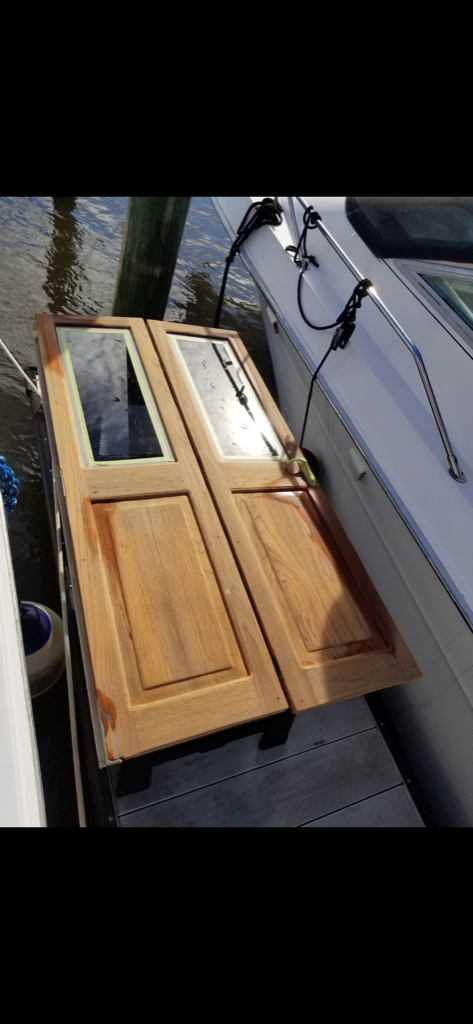 Custom yacht doors before refinishing
