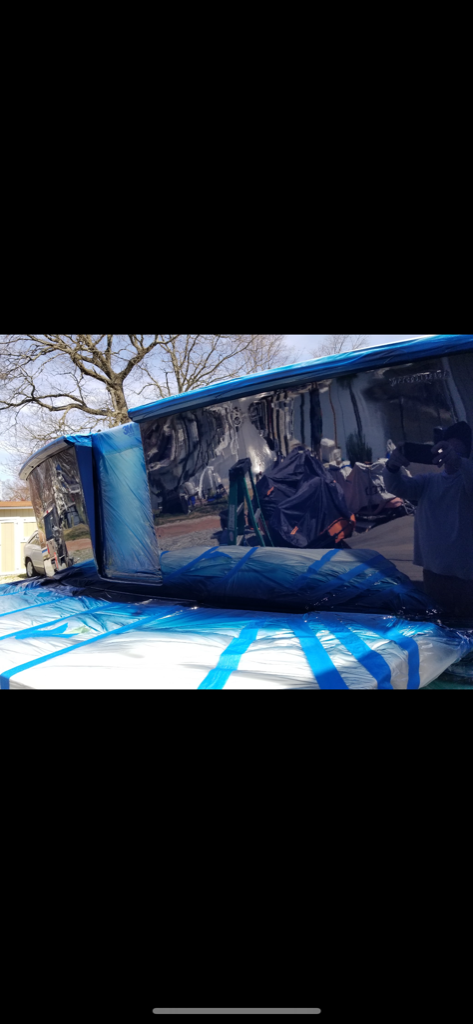 Blue boat hull showing glossy paint finish